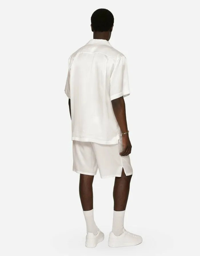 Dolce and Gabbana Trousers And Shorts Men Silk Satin Jogging Shorts With Metal DG Logo White Dolce and Gabbana Trousers And Shorts Men Silk Satin Jogging Shorts With Metal DG Logo White