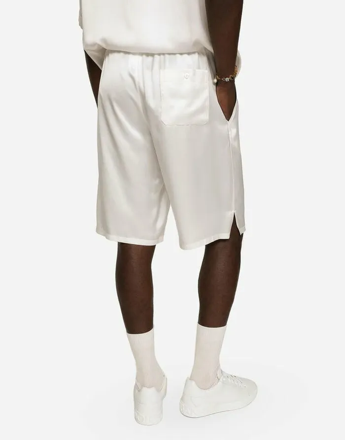Dolce and Gabbana Trousers And Shorts Men Silk Satin Jogging Shorts With Metal DG Logo White Dolce and Gabbana Trousers And Shorts Men Silk Satin Jogging Shorts With Metal DG Logo White