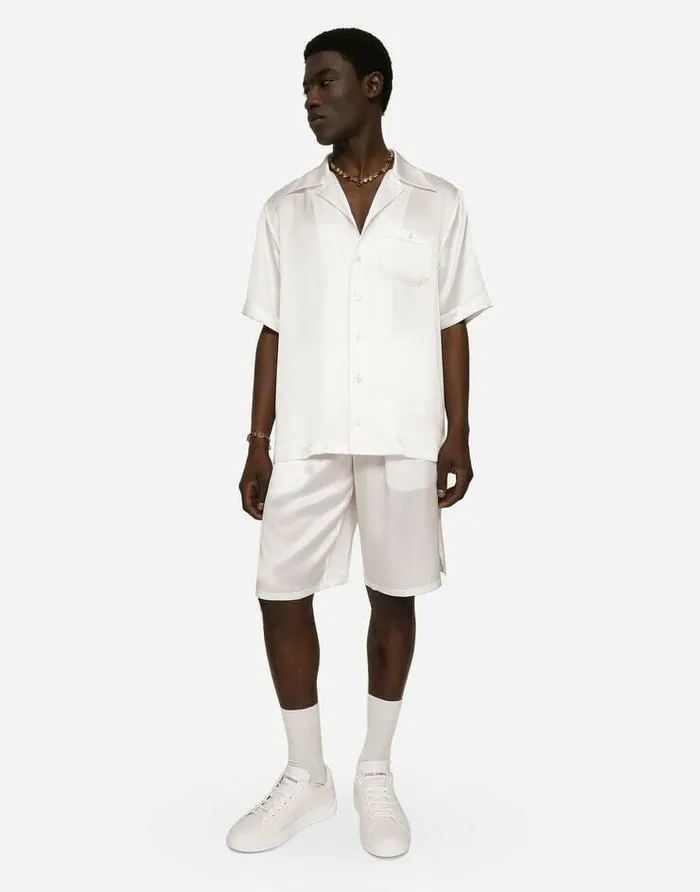 Dolce and Gabbana Trousers And Shorts Men Silk Satin Jogging Shorts With Metal DG Logo White Dolce and Gabbana Trousers And Shorts Men Silk Satin Jogging Shorts With Metal DG Logo White
