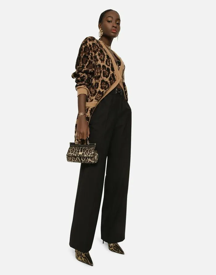 Dolce and Gabbana Trousers And Shorts Women Flared Wool Pants With Logo Tag Black Dolce and Gabbana Trousers And Shorts Women Flared Wool Pants With Logo Tag Black