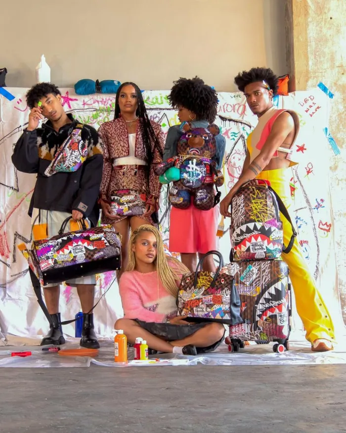 SPRAYGROUND SHARKS IN PARIS THE RIZZ SAVVY CROSSBODY Bags